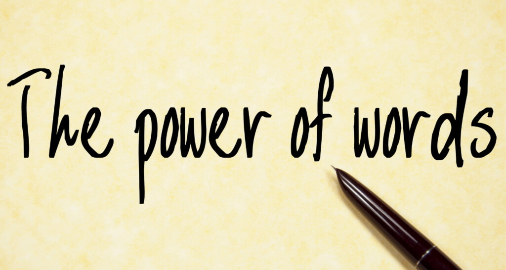 Pen and writing with "The power of words"